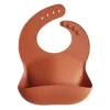Mushie silikoninen ruokalappu (clay)